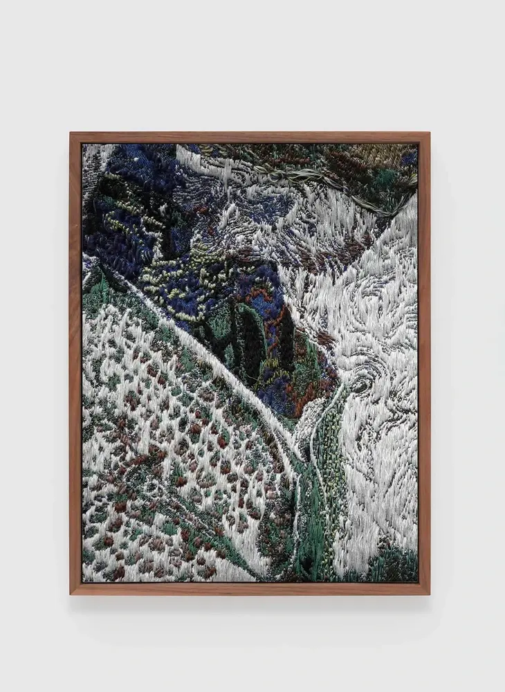 Framed embroidered landscape tapestry using upcycled luxury textile waste