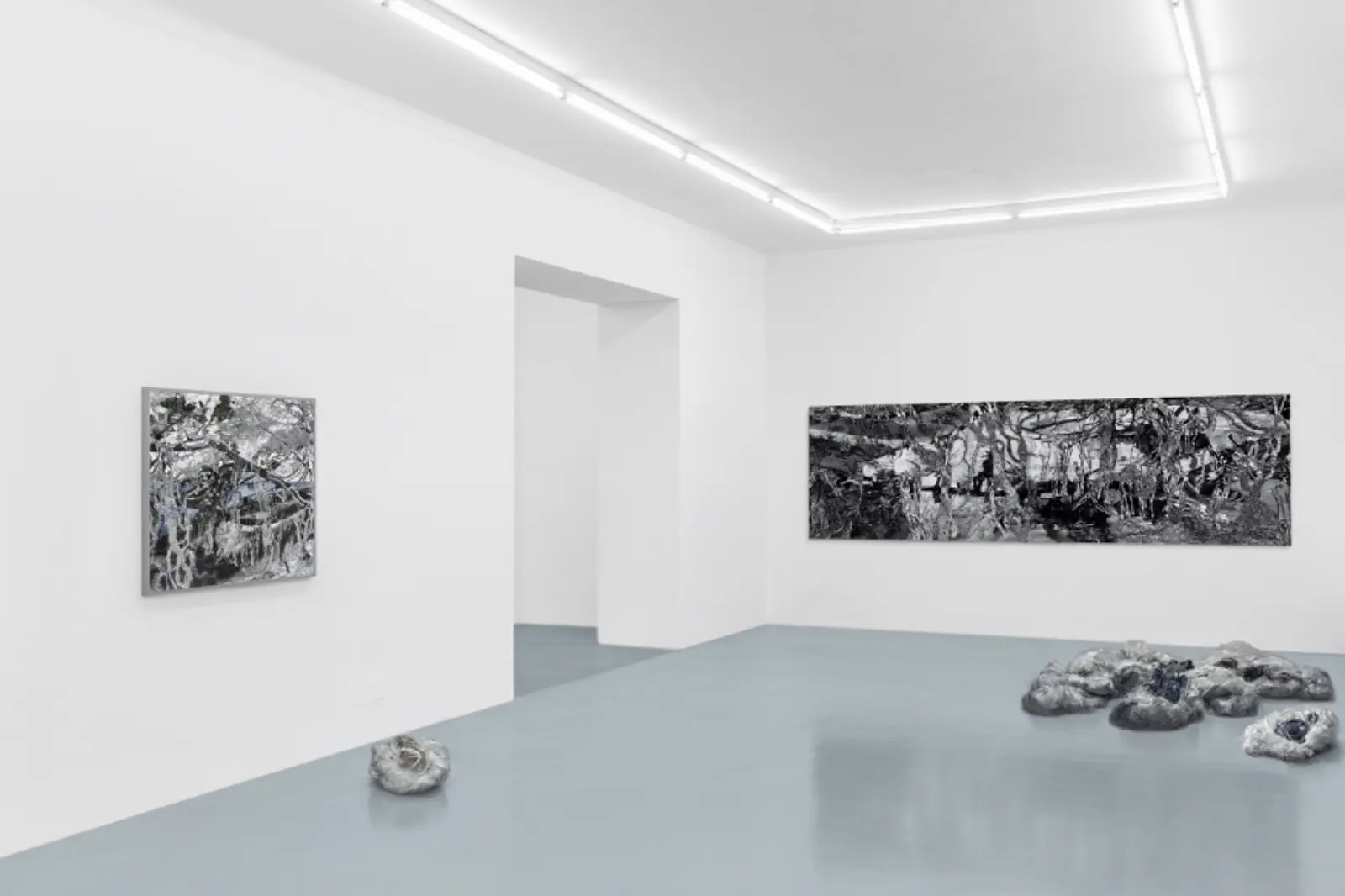 Anthropocene exhibition with textile tapestries and blown glass cocoon by Coco Brun