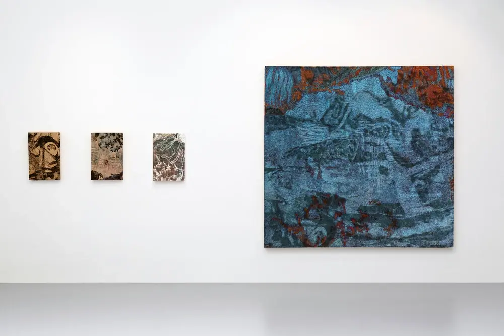 Exhibition view, anthropic landscapes, embroidered tapestries
